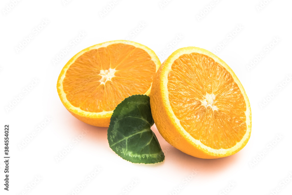 Fototapeta premium Ripe orange isolated on white background - fresh citrus fruit photography, orange cut in half