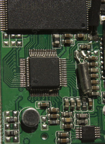 the electonic chip on green pcb closeup