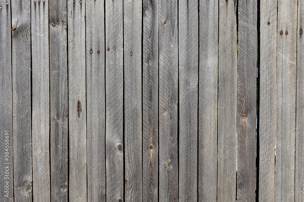 Beautiful horizontal texture of gray boards with knots and resin is in the photo Beautiful horizontal texture of gray boards with knots and resin is in the photo