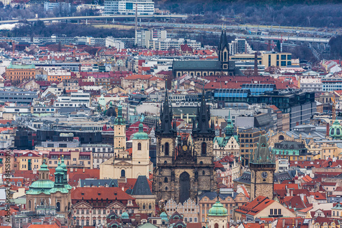 Aerial view of Prague old town and cityscape with hurch of Our Lady before Tyn on the Old Town Square on a cloudy day from top of Petrin Hill, Prague, Czech Republic