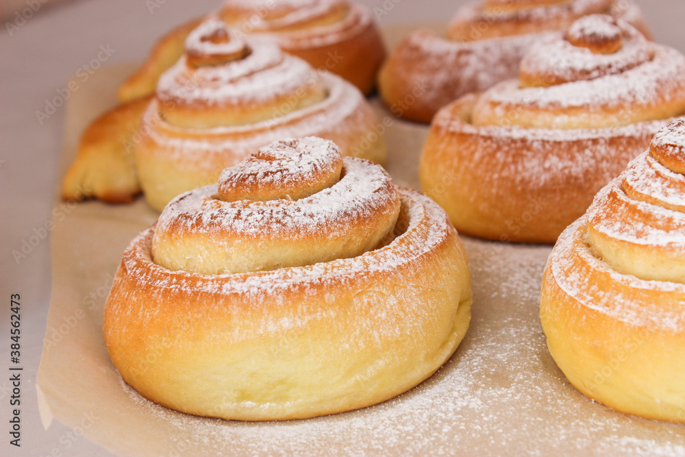 Soft, fluffy buns sprinkled with powdered sugar Soft, fluffy buns sprinkled with powdered sugar