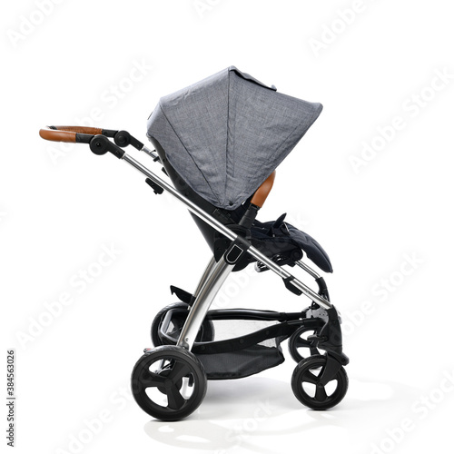 Fotografija Baby stroller side view isolated on white background