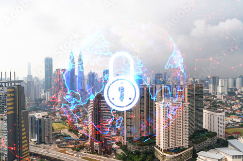 Photography Padlock icon hologram over panorama city view of Kuala Lumpur to protect business, Malaysia, Asia