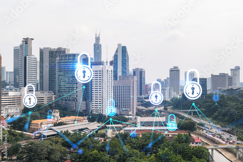 Canvas Print Padlock icon hologram over panorama city view of Kuala Lumpur to protect business, Malaysia, Asia