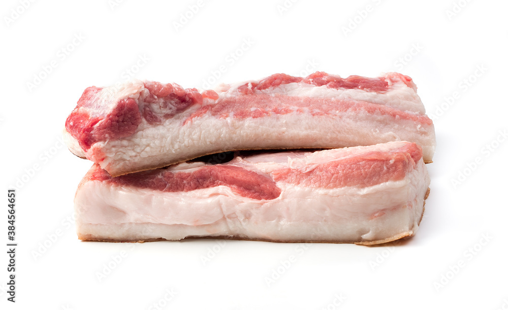 Fresh pig meat with layers of fat isolated on a white background. Butcher shop. The concept of fresh, natural products.