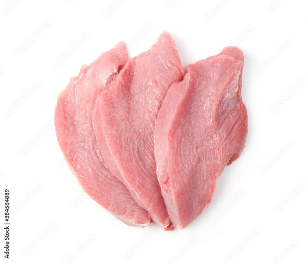 Diet Turkey meat is cut into steaks, isolated on a white background. Butcher shop. The concept of fresh, natural products. Diet Turkey meat is cut into steaks, isolated on a white background. Butcher shop. The concept of fresh, natural products.