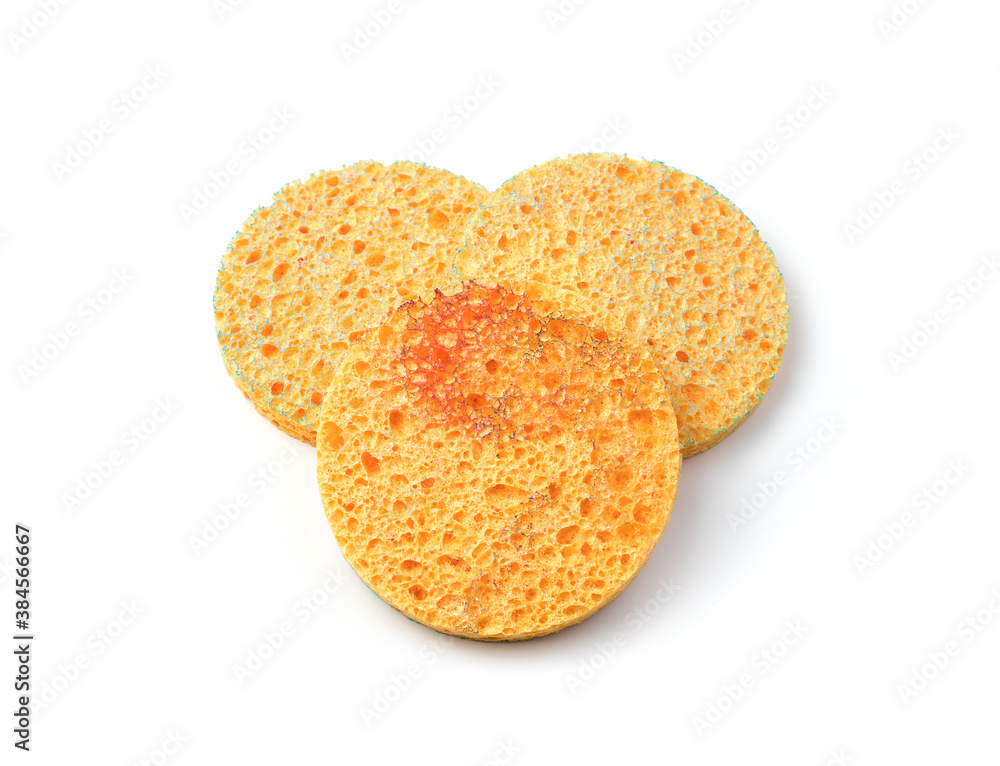 Spa accessories, face wash sponges on a white background, side view. Beauty, skin care. The concept of a healthy lifestyle. Spa accessories, face wash sponges on a white background, side view. Beauty, skin care. The concept of a healthy lifestyle.