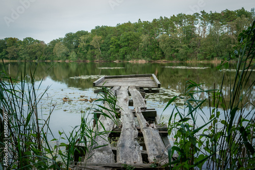 Old wooden landing stage at Lake Lochow near Ferchesar at nature reserve Westhavelland