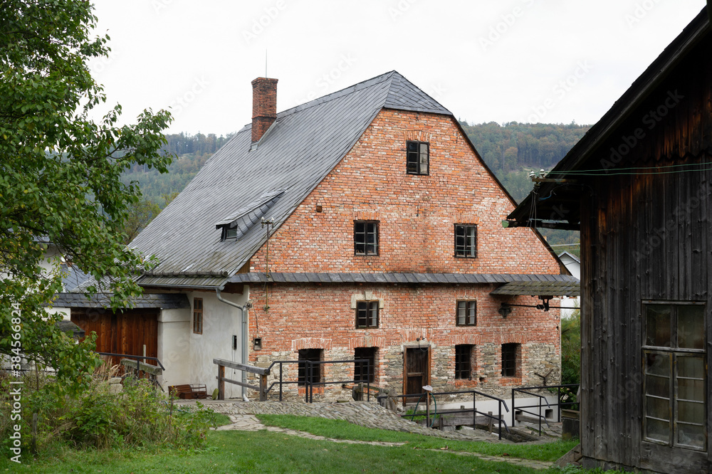 Wesselsky watermill (Vodni mlyn Wesselsky), Odry, Czech Republic / Czechia - building of historical water mill. House and cottage in village, rural area and countryside. Wesselsky watermill (Vodni mlyn Wesselsky), Odry, Czech Republic / Czechia - building of historical water mill. House and cottage in village, rural area and countryside.