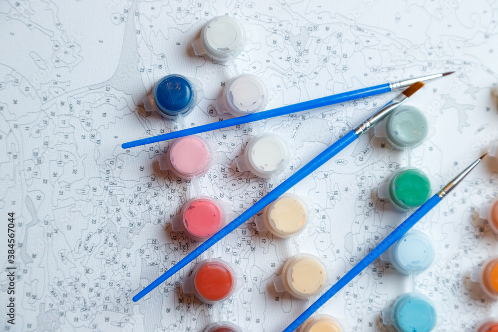 Paints and brushes. Painting by numbers. Paints and brushes. Painting by numbers.