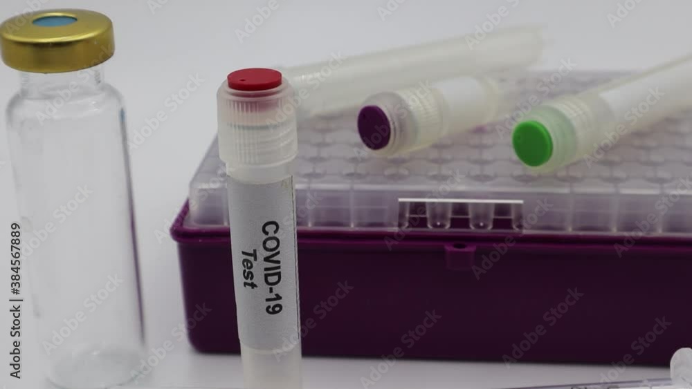 Test tube with Covid-19 label. Microbiology laboratory equipment. Coronavirus, Covid-19 test Test tube with Covid-19 label. Microbiology laboratory equipment. Coronavirus, Covid-19 test