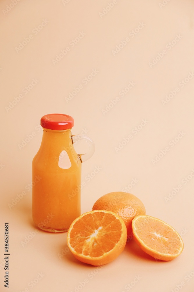 Fresh orange juice bottle with fresh orange. Fresh orange juice bottle with fresh orange.