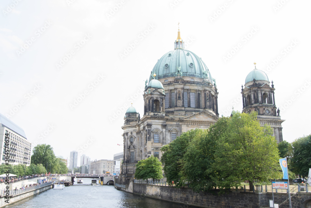 St. Sophia church in Berlin on the museum island with its river.