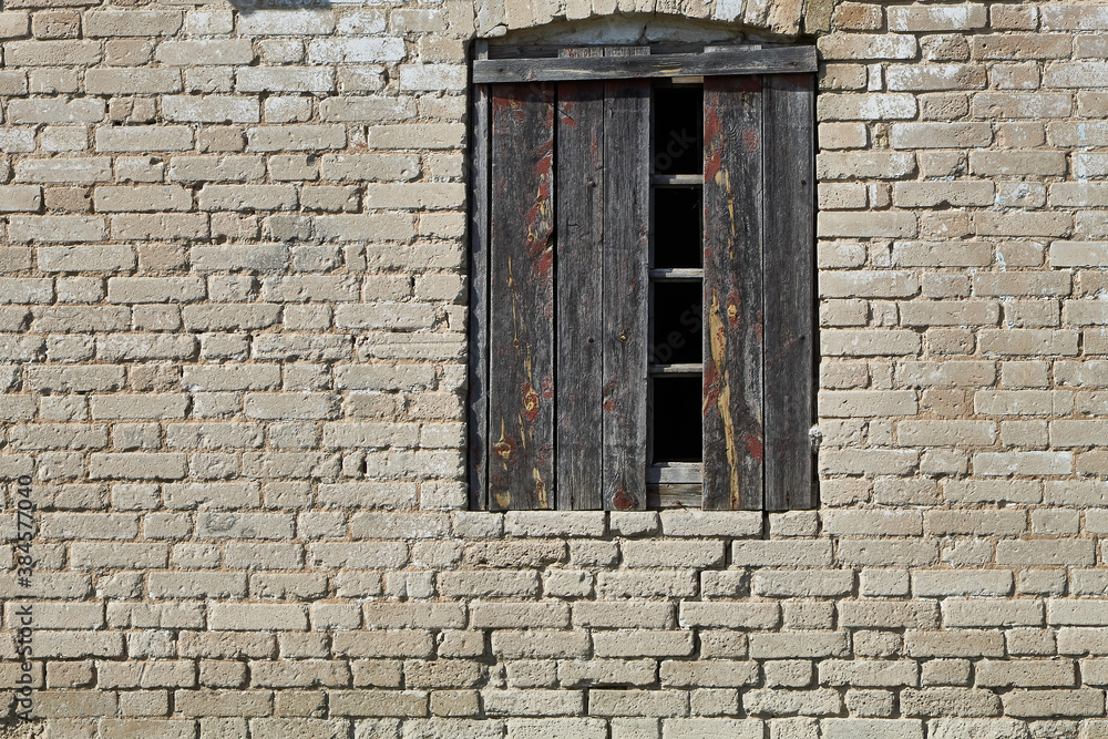old window with red shutters background old window with red shutters background