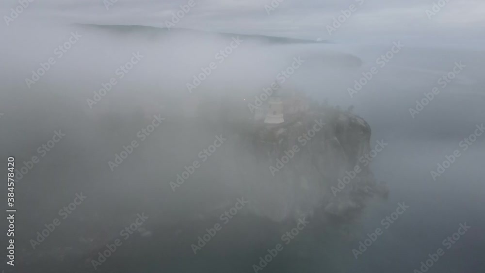 Split Rock lighthouse covered with fog, North Shore Minnesota by Lake Superior Split Rock lighthouse covered with fog, North Shore Minnesota by Lake Superior