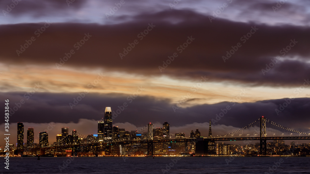 Dramatic Sky over San Francisco Downtown via Port View Park in Oakland California