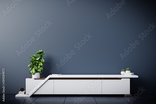 TV cabinet in modern empty room,Dark wall. © Vanit่jan