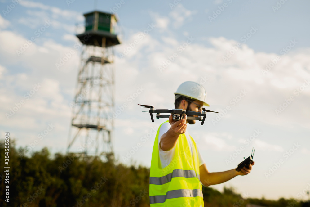 custom made wallpaper toronto digitalDrone operator Launching a drone on a countryside environment