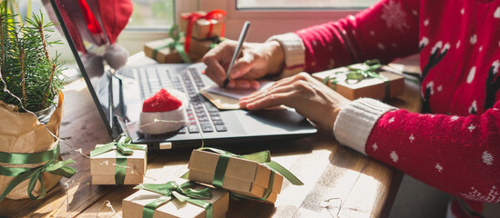 Christmas online shopping, sales and discounts promotions during the Christmas holidays, online shopping at home and lockdown coronavirus.Xmas.