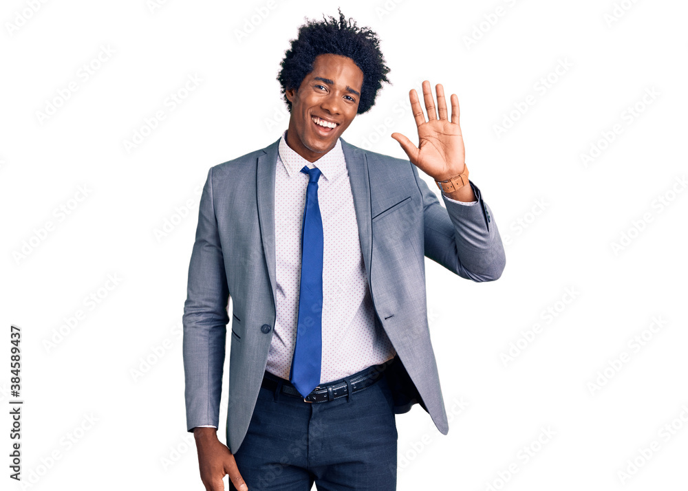 Handsome african american man with afro hair wearing business jacket waiving saying hello happy and smiling, friendly welcome gesture Handsome african american man with afro hair wearing business jacket waiving saying hello happy and smiling, friendly welcome gesture