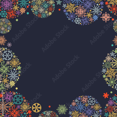 Christmas frame, colorful snowflakes in round bauble ornaments over dark background