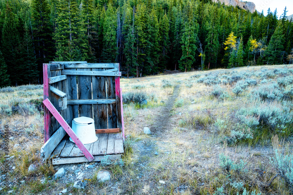 Primitive 2 walled outhouse in the mountains of Idaho Primitive 2 walled outhouse in the mountains of Idaho