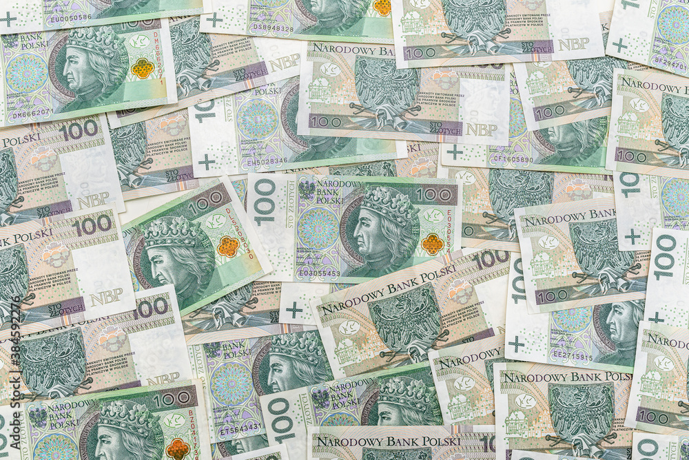 Background made of the Polish 100 zloty banknote, background for finance and economy.
