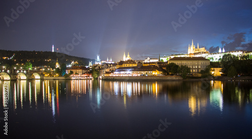 Pargue charles bridge and prague castle by night reflections river