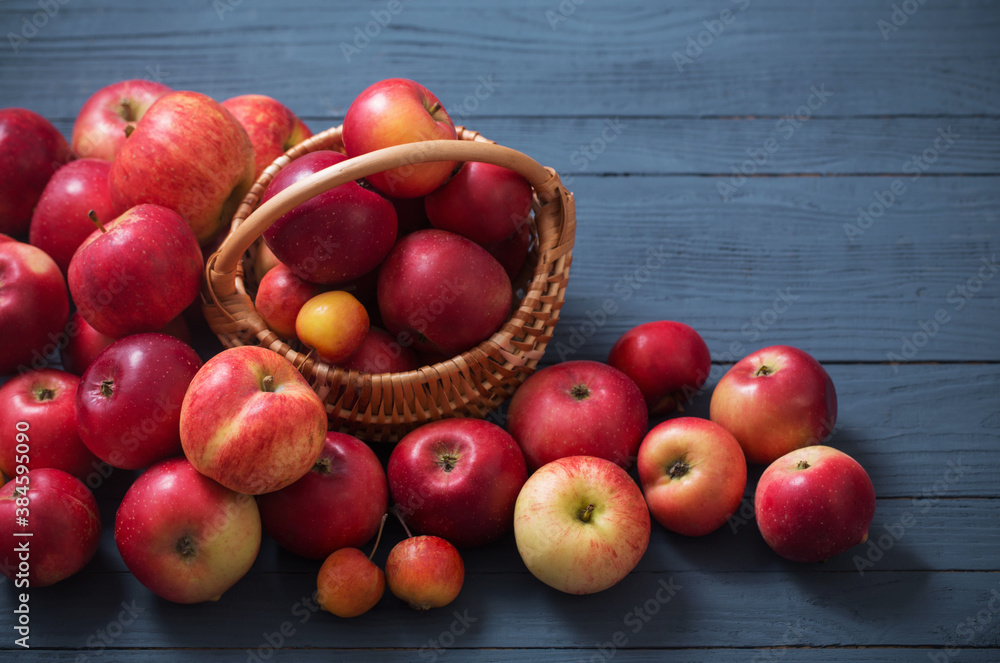 red apples on blue wooden background red apples on blue wooden background