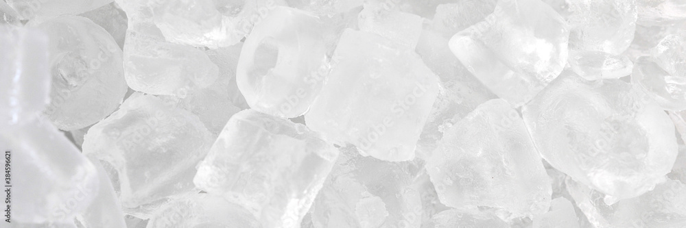 Ice background on the ice bucket. Ice is very cold. Cubes for drinking or cooking. Ice background on the ice bucket. Ice is very cold. Cubes for drinking or cooking.