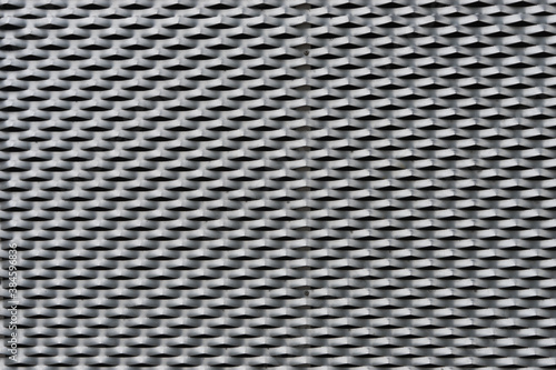Metal texture background with waved surface in a modern facade