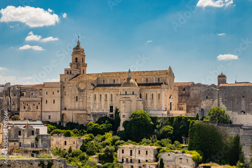 Gravina in Puglia  Italy. The ancient cathedral of Santa Maria Assunta  with its bell tower  apse and dome.