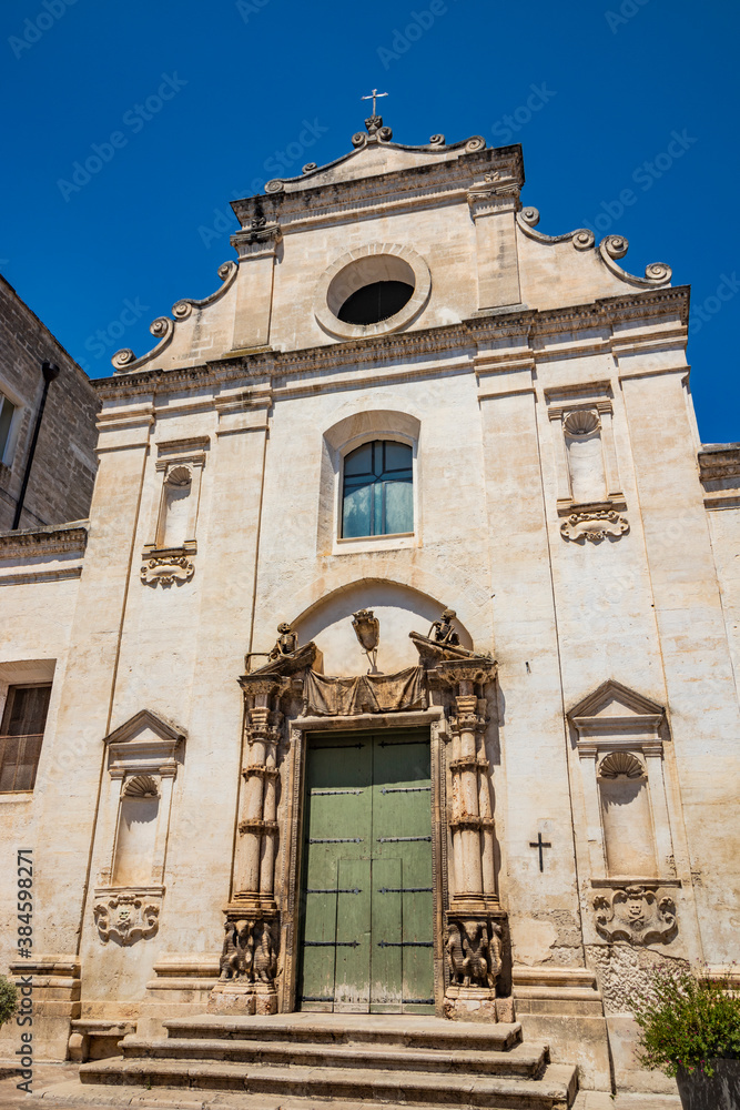 Gravina in Puglia, Italy. The ancient Church of Purgatory (S. Maria del Suffragio), with its beautiful portal surmounted by two statues of skeletons.