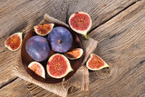 Fig fruits on wooden background top view