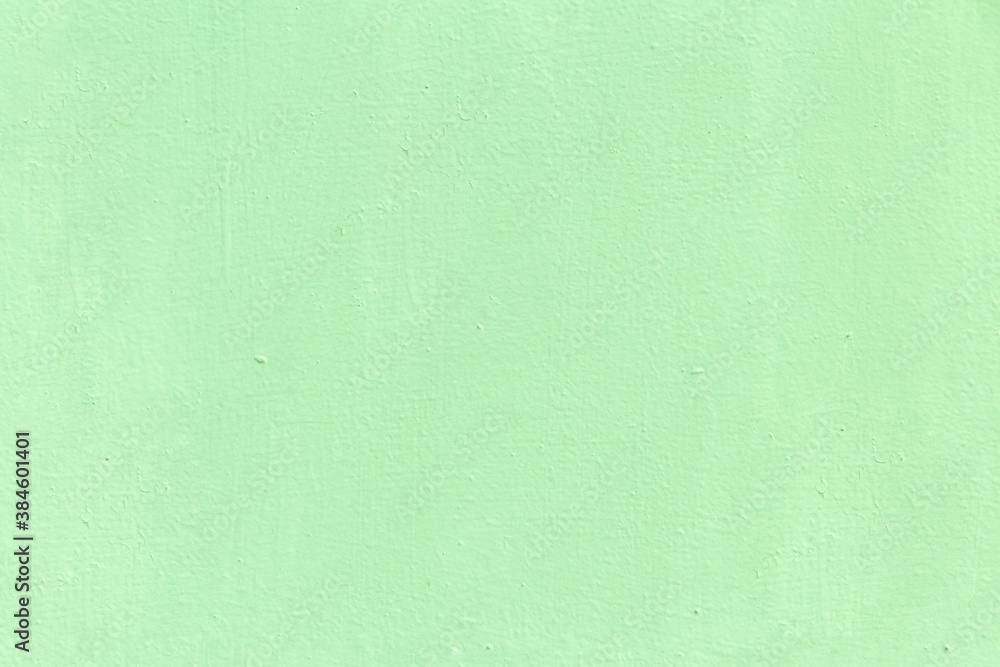 Gently green textured surface as a background for graphics and design Gently green textured surface as a background for graphics and design