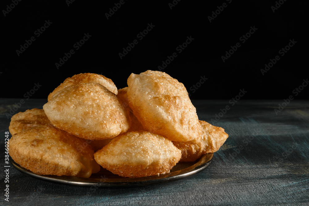 Traditional Indian Bengali puff flatbread luci Stock Photo Adobe Stock