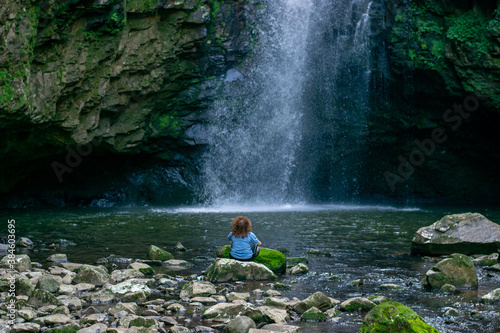 person with a waterfall photo