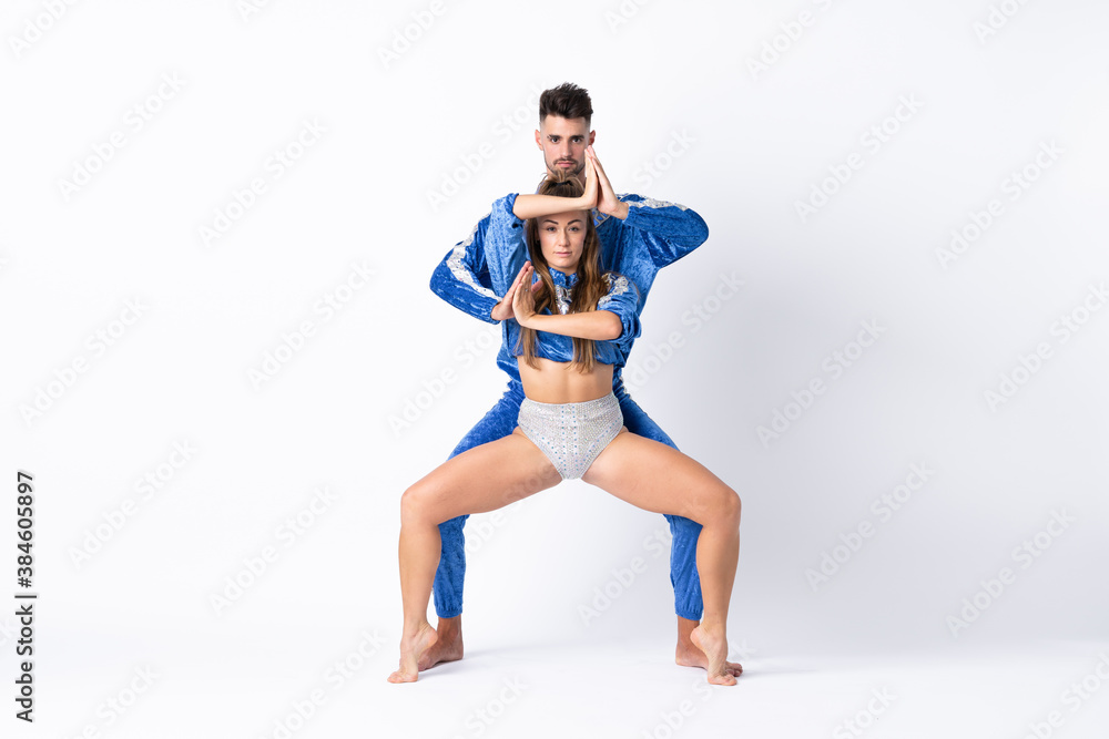 Fototapeta premium Couple dancing over isolated white background