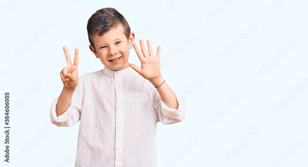 Cute blond kid wearing elegant shirt showing and pointing up with fingers number seven while smiling confident and happy. Cute blond kid wearing elegant shirt showing and pointing up with fingers number seven while smiling confident and happy.
