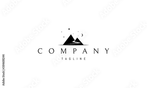 Vector logo on which an abstract image of two mountains and a road in the form of the letter S.