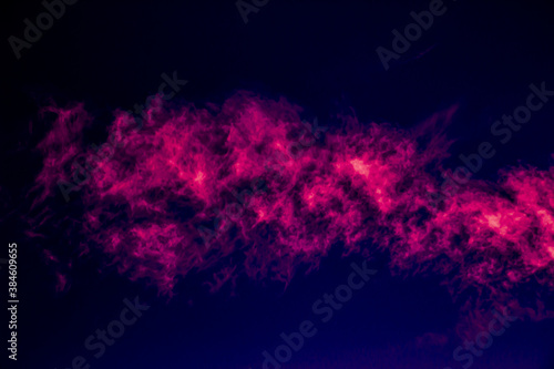Abstract red fluid texture on dark background