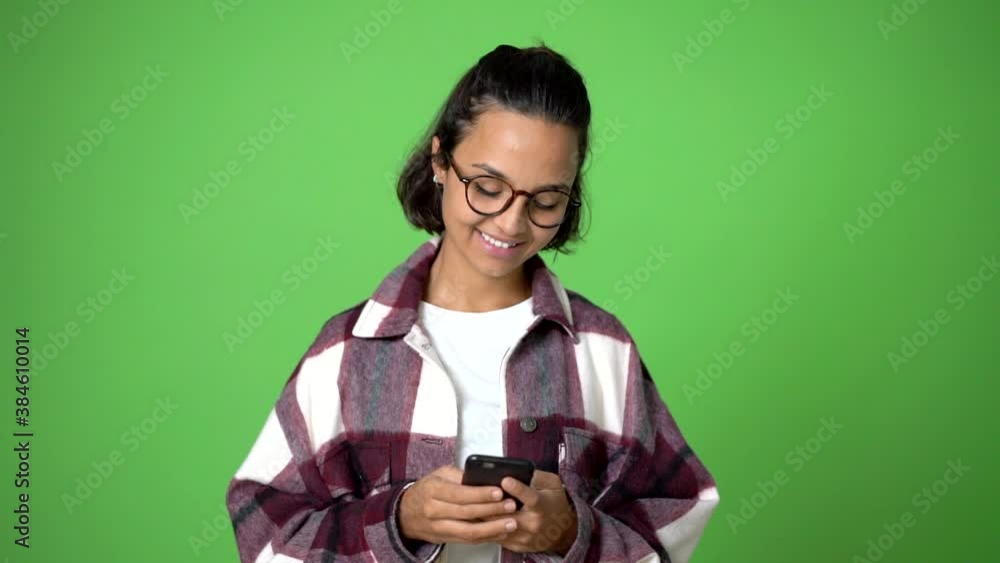woman sending a message or email with the mobile woman sending a message or email with the mobile