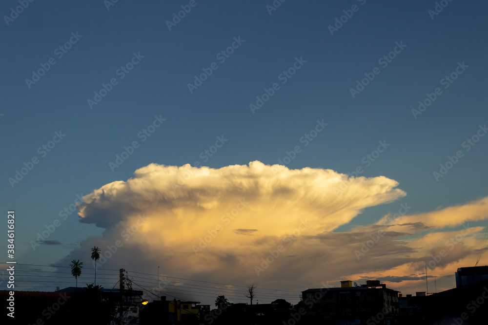 big cloud in the sky at sunset