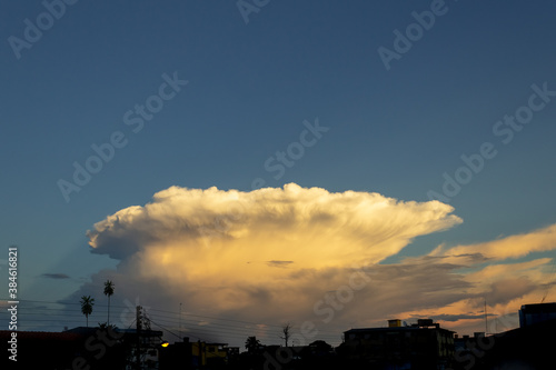 big cloud in the sky at sunset