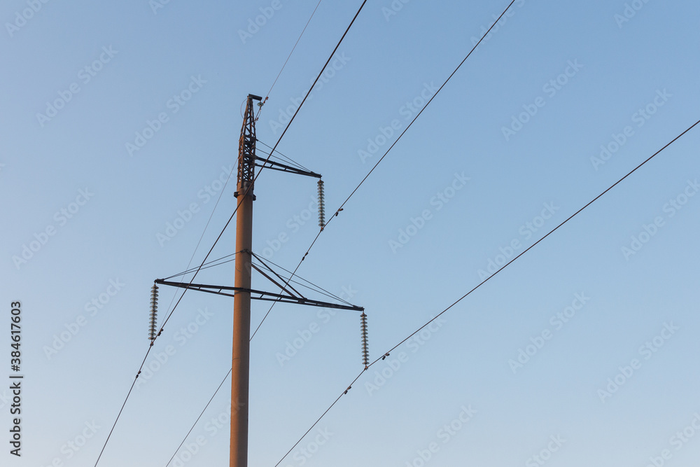 Closer look of the electric post with the big wires on it. Post with electric cables. Closer look of the electric post with the big wires on it. Post with electric cables.