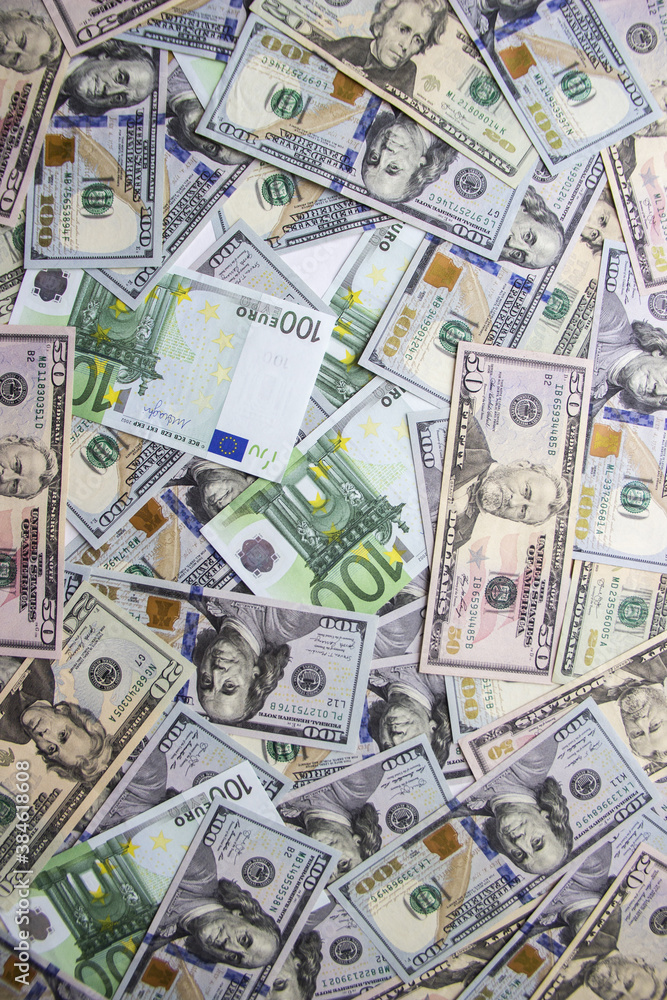 Money lies in a heap on the table scattered. Money lies in a heap on the table scattered.