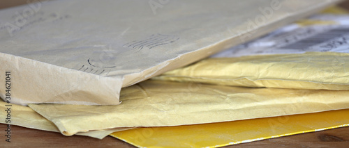 heap of packages on a wooden table