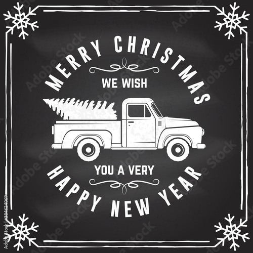 We wish you a very Merry Christmas and Happy New Year stamp sticker with classic red christmas ttruck. Vector. Vintage typographic design for xmas, new year emblem in retro style with pickup.