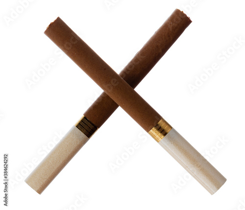 Two crossed cigarettes isolated on white background