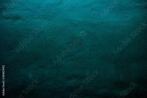 Petrol colored abstract texture background with textures of different shades of petrol also called teal photo